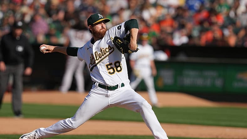Aug 5, 2023; Oakland, California, USA; Oakland Athletics starting pitcher Paul Blackburn (58) throws a pitch against the San Francisco Giants during the sixth inning at Oakland-Alameda County Coliseum. Mandatory Credit: Darren Yamashita-USA TODAY Sports