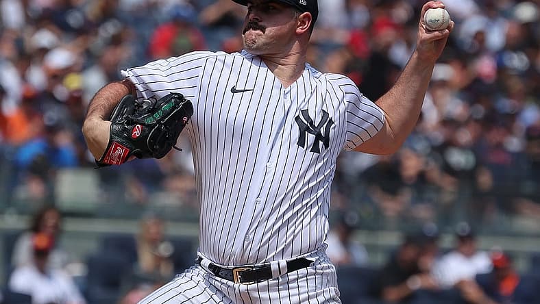 Aug 6, 2023; Bronx, New York, USA; New York Yankees starting pitcher Carlos Rodon (55) delivers a pitch during the first inning against the Houston Astros at Yankee Stadium. Mandatory Credit: Vincent Carchietta-USA TODAY Sports