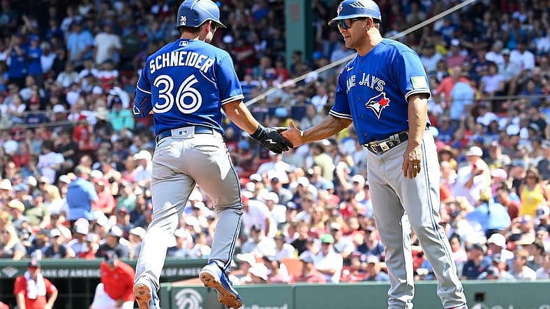 Aug 6, 2023; Boston, Massachusetts, USA; Toronto Blue Jays second baseman Davis Schneider (36) celebrates a two run home run against the Boston Red Sox with third base coach Luis Rivera (20) in the fourth inning at Fenway Park. Mandatory Credit: Eric Canha-USA TODAY Sports