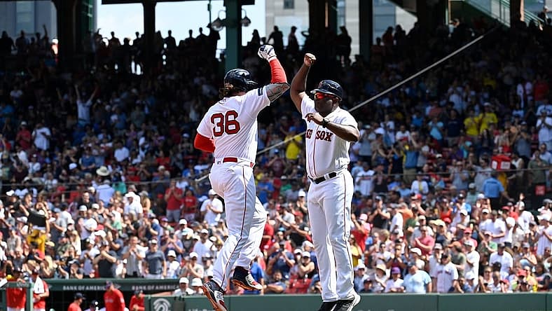 Aug 6, 2023; Boston, Massachusetts, USA; Boston Red Sox first baseman Triston Casas (36) celebrates his home run against the Toronto Blue Jays with third base coach Carlos Febles (53) during the fourth inning at Fenway Park. Mandatory Credit: Eric Canha-USA TODAY Sports