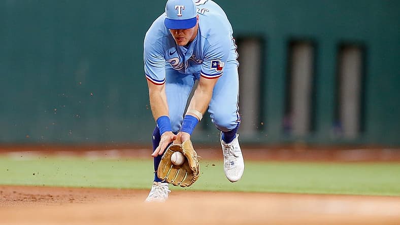 Aug 6, 2023; Arlington, Texas, USA; Texas Rangers third baseman Josh Jung (6) fields a ground ball during the first inning against the Miami Marlins at Globe Life Field. Mandatory Credit: Andrew Dieb-USA TODAY Sports