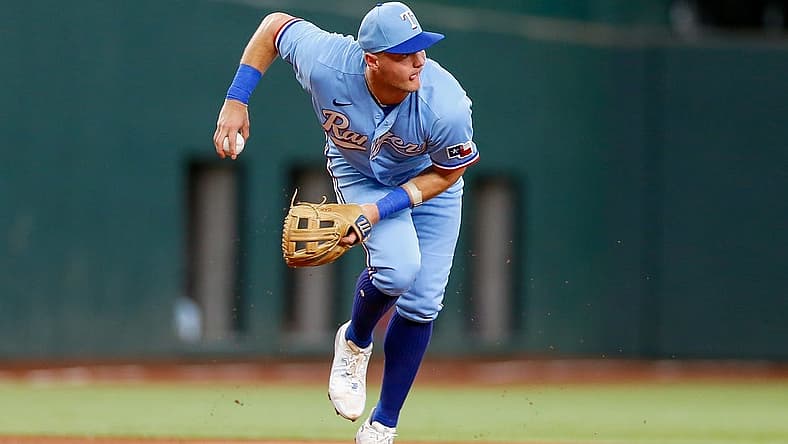 Aug 6, 2023; Arlington, Texas, USA; Texas Rangers third baseman Josh Jung (6) fields a ground ball during the first inning against the Miami Marlins at Globe Life Field. Mandatory Credit: Andrew Dieb-USA TODAY Sports