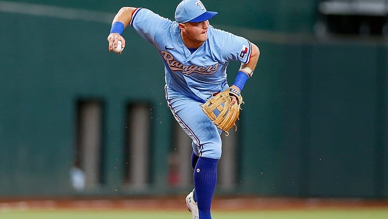 Aug 6, 2023; Arlington, Texas, USA; Texas Rangers third baseman Josh Jung (6) fields a ground ball during the first inning against the Miami Marlins at Globe Life Field. Mandatory Credit: Andrew Dieb-USA TODAY Sports