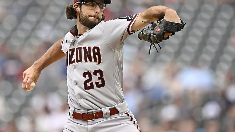 Aug 6, 2023; Minneapolis, Minnesota, USA; Arizona Diamondbacks pitcher Zac Gallen (23) delivers a pitch against the Minnesota Twins during the second inning at Target Field. Mandatory Credit: Nick Wosika-USA TODAY Sports