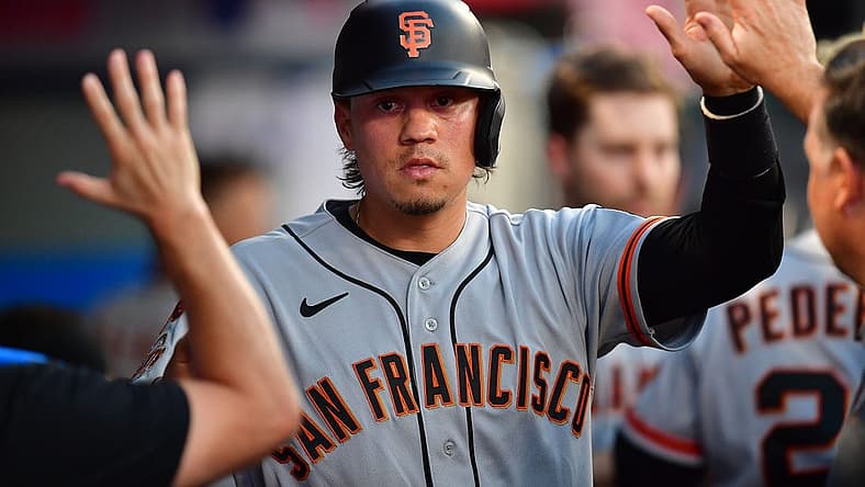 Aug 7, 2023; Anaheim, California, USA; San Francisco Giants first baseman Wilmer Flores (41) is greeted after scoring a run against the Los Angeles Angels during the fourth inning at Angel Stadium. Mandatory Credit: Gary A. Vasquez-USA TODAY Sports