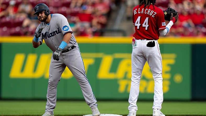Miami Marlins third baseman Jake Burger (36) jesters to the dugout after hitting a double in the second inning of the MLB baseball game between Cincinnati Reds and Miami Marlins at Great American Ball Park in Cincinnati on Tuesday, Aug. 8, 2023.