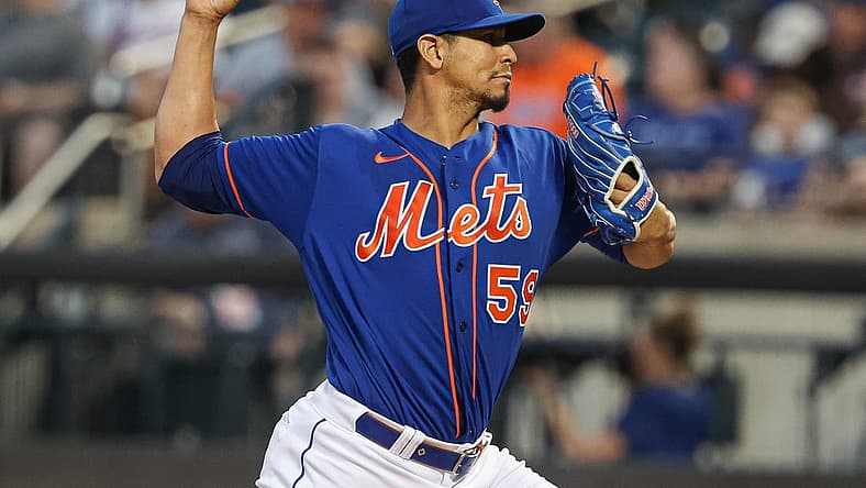 Aug 8, 2023; New York City, New York, USA; New York Mets starting pitcher Carlos Carrasco (59) delivers a pitch during the third inning against the Chicago Cubs at Citi Field. Mandatory Credit: Vincent Carchietta-USA TODAY Sports