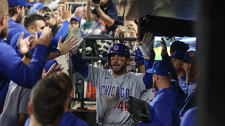 Aug 8, 2023; New York City, New York, USA; Chicago Cubs center fielder Mike Tauchman (40) celebrates with teammates after his solo home run during the eighth inning against the New York Mets at Citi Field. Mandatory Credit: Vincent Carchietta-USA TODAY Sports