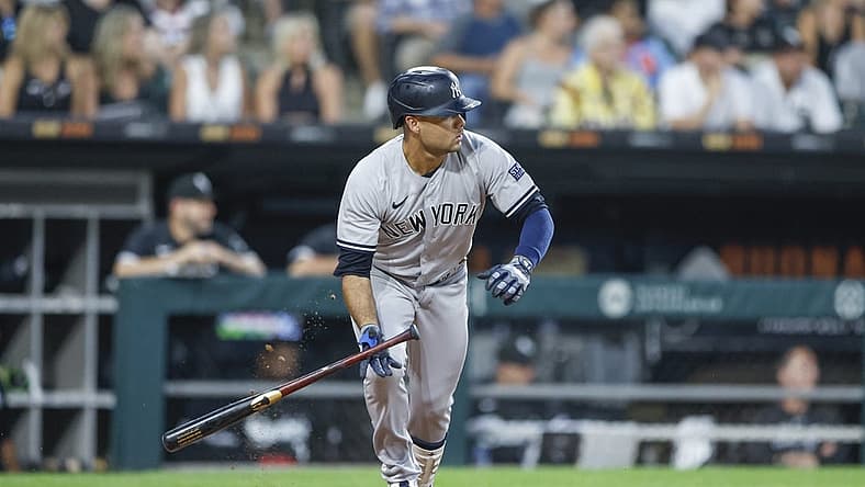 Aug 8, 2023; Chicago, Illinois, USA; New York Yankees center fielder Isiah Kiner-Falefa (12) watches his two-run double against the Chicago White Sox during the fourth inning at Guaranteed Rate Field. Mandatory Credit: Kamil Krzaczynski-USA TODAY Sports