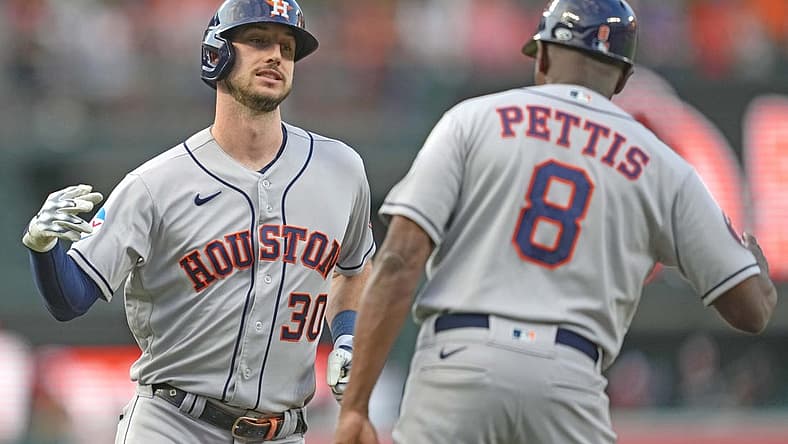 Aug 9, 2023; Baltimore, Maryland, USA; Houston Astros outfielder Kyle Tucker (30) celebrates with coach Gary Pettis (8) following his two run home run in the first inning against the Baltimore Orioles at Oriole Park at Camden Yards. Mandatory Credit: Mitch Stringer-USA TODAY Sports