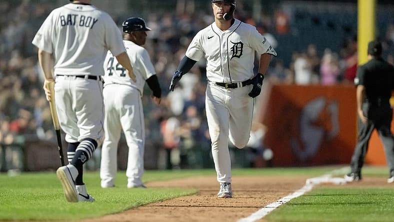 Aug 9, 2023; Detroit, Michigan, USA;  Detroit Tigers first baseman Spencer Torkelson (20) reaches home after hitting his second home run of the game against the Minnesota Twins in the seventh inning at Comerica Park. Mandatory Credit: Lon Horwedel-USA TODAY Sports