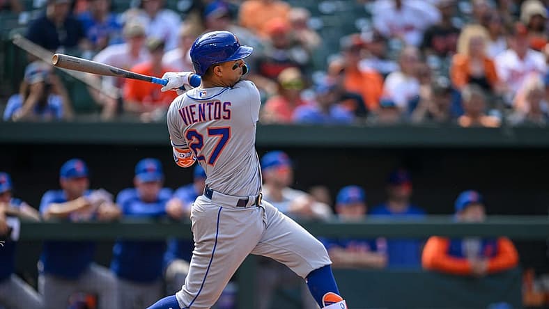Aug 6, 2023; Baltimore, Maryland, USA; New York Mets third baseman Mark Vientos (27) hits a double during the ninth inning against the Baltimore Orioles at Oriole Park at Camden Yards. Mandatory Credit: Reggie Hildred-USA TODAY Sports