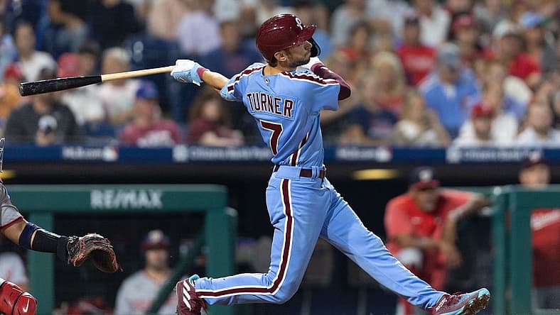 Aug 10, 2023; Philadelphia, Pennsylvania, USA; Philadelphia Phillies shortstop Trea Turner (7) hits a two RBI home run during the sixth inning against the Washington Nationals at Citizens Bank Park. Mandatory Credit: Bill Streicher-USA TODAY Sports