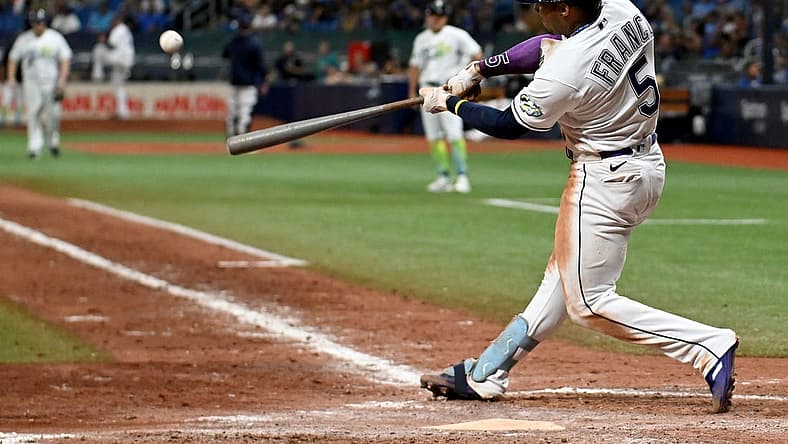 Aug 11, 2023; St. Petersburg, Florida, USA; Tampa Bay Rays shortstop Wander Franco (5) hits a walk off home run in the ninth inning against the Cleveland Guardians at Tropicana Field. Mandatory Credit: Jonathan Dyer-USA TODAY Sports