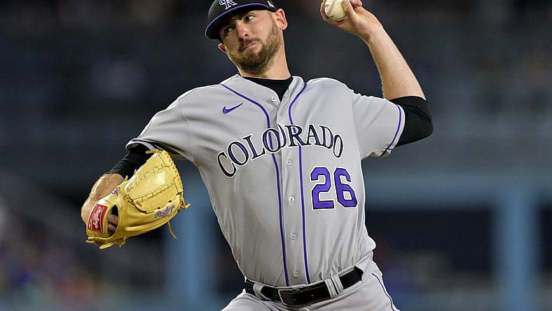 Aug 11, 2023; Los Angeles, California, USA; Colorado Rockies starting pitcher Austin Gomber (26) delivers in the third inning against the Los Angeles Dodgers at Dodger Stadium. Mandatory Credit: Jayne Kamin-Oncea-USA TODAY Sports