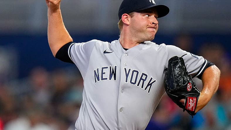 Aug 12, 2023; Miami, Florida, USA; New York Yankees relief pitcher Michael King (34) throws a pitch against the Miami Marlins during the first inning at loanDepot Park. Mandatory Credit: Rich Storry-USA TODAY Sports