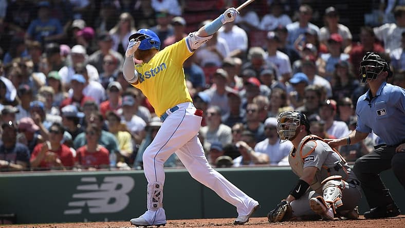 Aug 13, 2023; Boston, Massachusetts, USA;  Boston Red Sox designated hitter Justin Turner (2) hits a home run during the third inning against the Detroit Tigers at Fenway Park. Mandatory Credit: Bob DeChiara-USA TODAY Sports