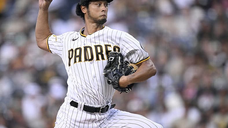 Aug 14, 2023; San Diego, California, USA; San Diego Padres starting pitcher Yu Darvish (11) throws a pitch against the Baltimore Orioles during the first inning at Petco Park. Mandatory Credit: Orlando Ramirez-USA TODAY Sports