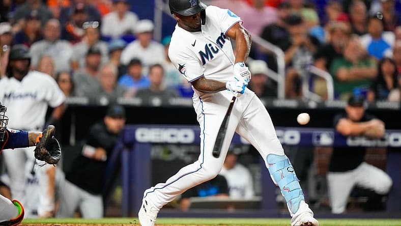 Aug 14, 2023; Miami, Florida, USA; Miami Marlins designated hitter Jorge Soler (12) hits a home run against the Houston Astros during the eighth inning at loanDepot Park. Mandatory Credit: Rich Storry-USA TODAY Sports