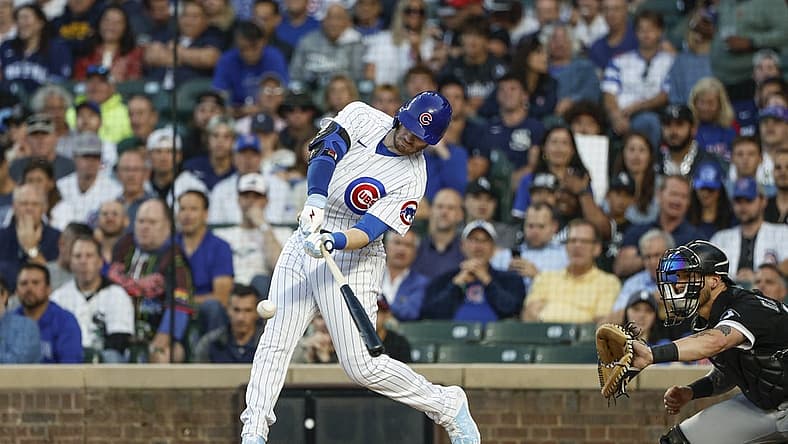 Aug 15, 2023; Chicago, Illinois, USA; Chicago Cubs left fielder Ian Happ (8) hits a two-run home run against the Chicago White Sox during the first inning at Wrigley Field. Mandatory Credit: Kamil Krzaczynski-USA TODAY Sports