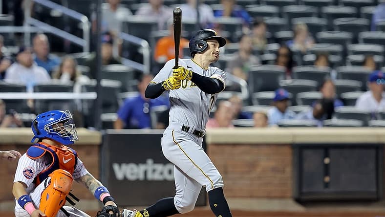 Aug 15, 2023; New York City, New York, USA; Pittsburgh Pirates left fielder Bryan Reynolds (10) follows through on an RBI triple against the New York Mets during the seventh inning at Citi Field. Mandatory Credit: Brad Penner-USA TODAY Sports
