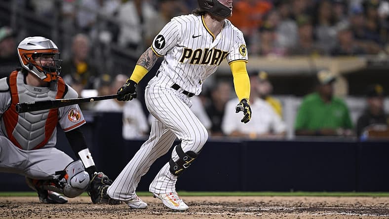 Aug 15, 2023; San Diego, California, USA; San Diego Padres right fielder Ben Gamel (16) hits a two-RBI double against the Baltimore Orioles during the fifth inning at Petco Park. Mandatory Credit: Orlando Ramirez-USA TODAY Sports