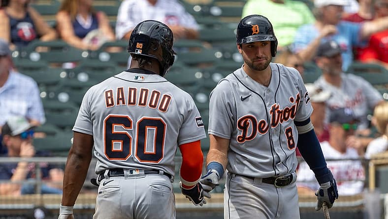 Aug 16, 2023; Minneapolis, Minnesota, USA; Detroit Tigers left fielder Akil Baddoo (60) celebrates with third baseman Matt Vierling (8) after scoring a run against the Minnesota Twins in the ninth inning at Target Field. Mandatory Credit: Jesse Johnson-USA TODAY Sports