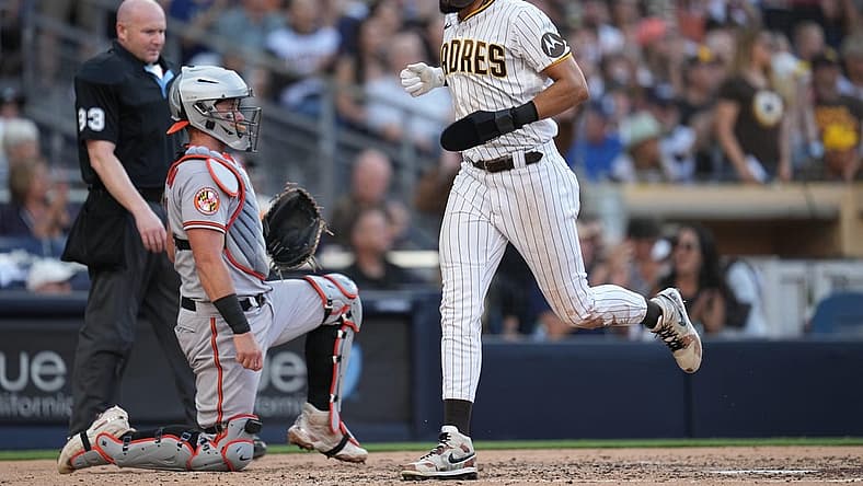 Aug 16, 2023; San Diego, California, USA; San Diego Padres right fielder Fernando Tatis Jr. (23) scores on an RBI single by first baseman Jake Cronenworth (not pictured) during the third inning against the Baltimore Orioles at Petco Park. Mandatory Credit: Ray Acevedo-USA TODAY Sports