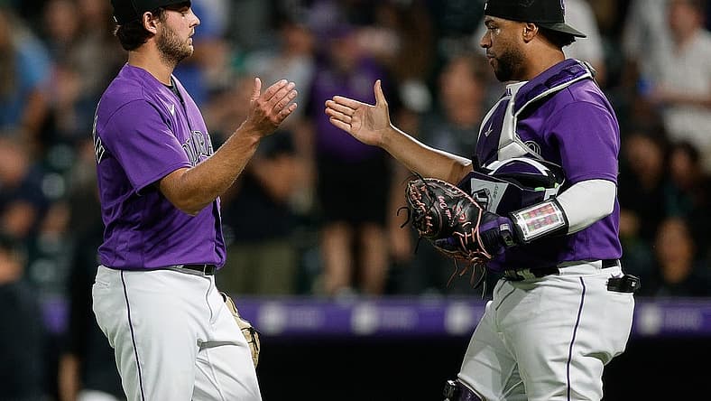 Aug 18, 2023; Denver, Colorado, USA; Colorado Rockies relief pitcher Karl Kauffmann (51) celebrates with catcher Elias Diaz (35) after the game against the Chicago White Sox at Coors Field. Mandatory Credit: Isaiah J. Downing-USA TODAY Sports