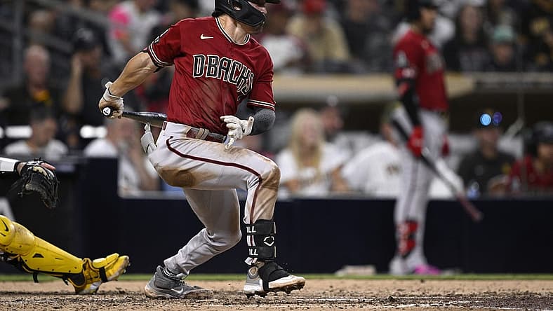 Aug 19, 2023; San Diego, California, USA; Arizona Diamondbacks right fielder Corbin Carroll (7) hits an RBI single against the San Diego Padres during the sixth inning at Petco Park. Mandatory Credit: Orlando Ramirez-USA TODAY Sports