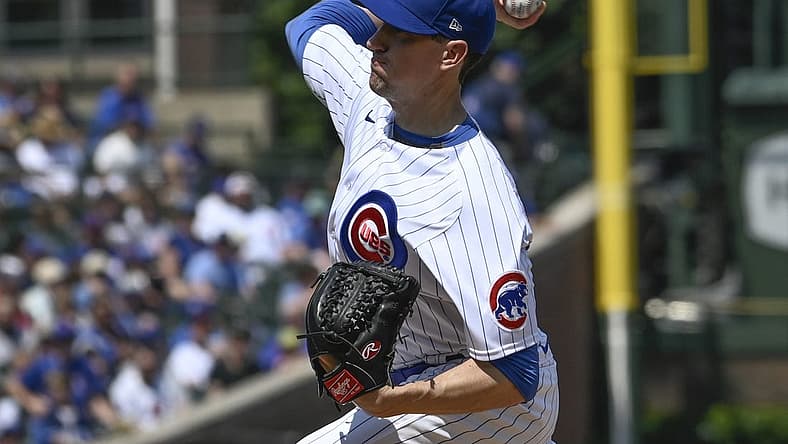 Aug 20, 2023; Chicago, Illinois, USA; Chicago Cubs starting pitcher Kyle Hendricks (28) delivers against the Kansas City Royals during the first inning at Wrigley Field. Mandatory Credit: Matt Marton-USA TODAY Sports