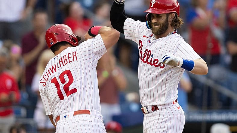 Aug 22, 2023; Philadelphia, Pennsylvania, USA; Philadelphia Phillies designated hitter Bryce Harper (3) celebrates with left fielder Kyle Schwarber (12) after hitting a two RBI home run during the first inning against the San Francisco Giants at Citizens Bank Park. Mandatory Credit: Bill Streicher-USA TODAY Sports