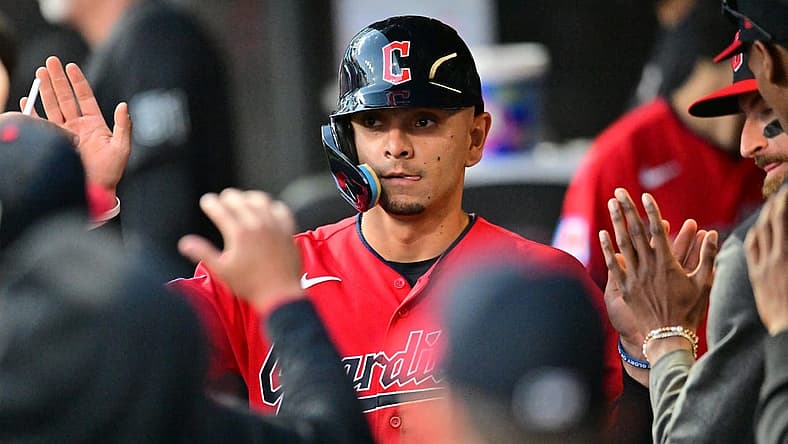 Aug 22, 2023; Cleveland, Ohio, USA; Cleveland Guardians second baseman Andres Gimenez (0) celebrates after scoring during the fourth inning against the Los Angeles Dodgers at Progressive Field. Mandatory Credit: Ken Blaze-USA TODAY Sports