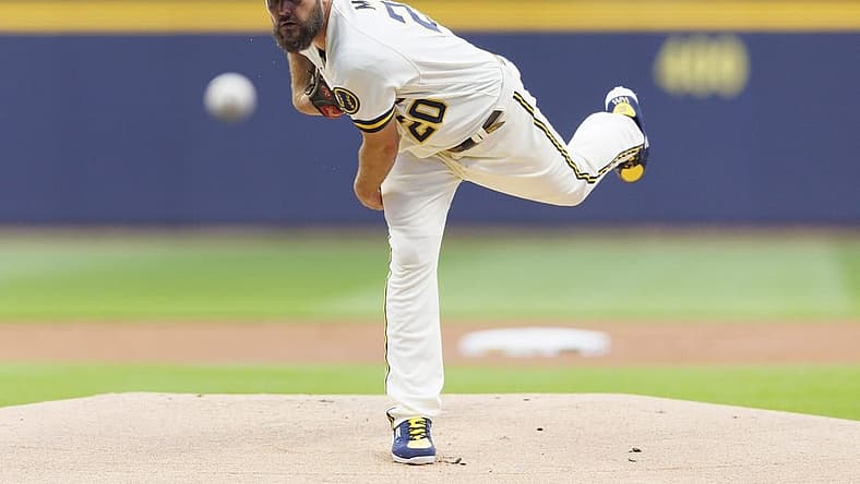 Aug 22, 2023; Milwaukee, Wisconsin, USA; Milwaukee Brewers pitcher Wade Miley (20) throws a pitch during the first inning against the Minnesota Twins at American Family Field. Mandatory Credit: Jeff Hanisch-USA TODAY Sports