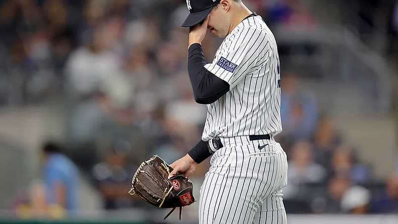 Aug 22, 2023; Bronx, New York, USA; New York Yankees relief pitcher Tommy Kahnle (41) reacts during the eighth inning against the Washington Nationals at Yankee Stadium. Mandatory Credit: Brad Penner-USA TODAY Sports