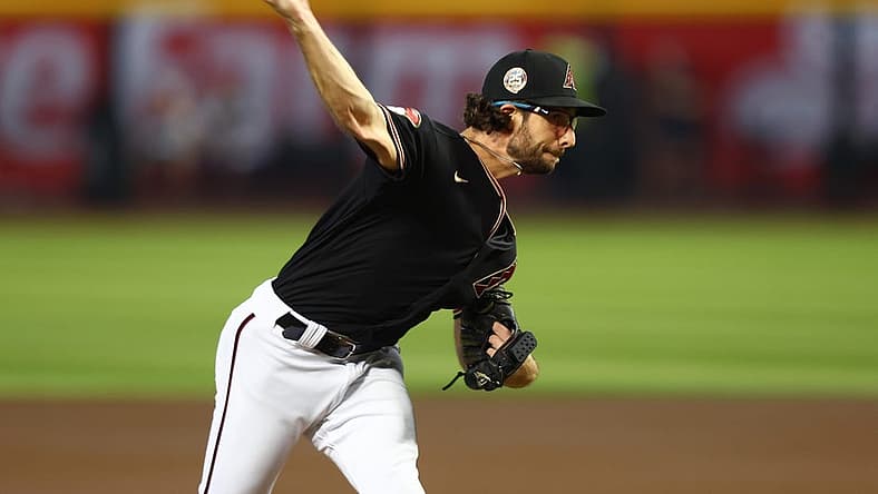 Aug 22, 2023; Phoenix, Arizona, USA; Arizona Diamondbacks pitcher Zac Gallen against the Texas Rangers at Chase Field. Mandatory Credit: Mark J. Rebilas-USA TODAY Sports