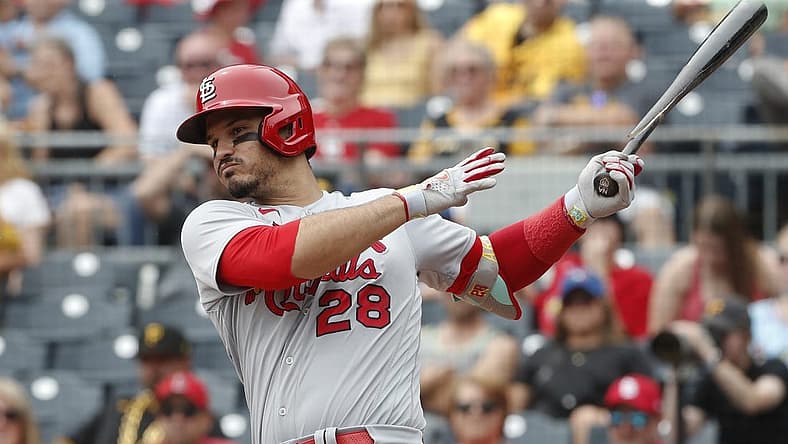Aug 23, 2023; Pittsburgh, Pennsylvania, USA; St. Louis Cardinals third baseman Nolan Arenado (28) hits a two run double against the Pittsburgh Pirates during the second inning at PNC Park. Mandatory Credit: Charles LeClaire-USA TODAY Sports