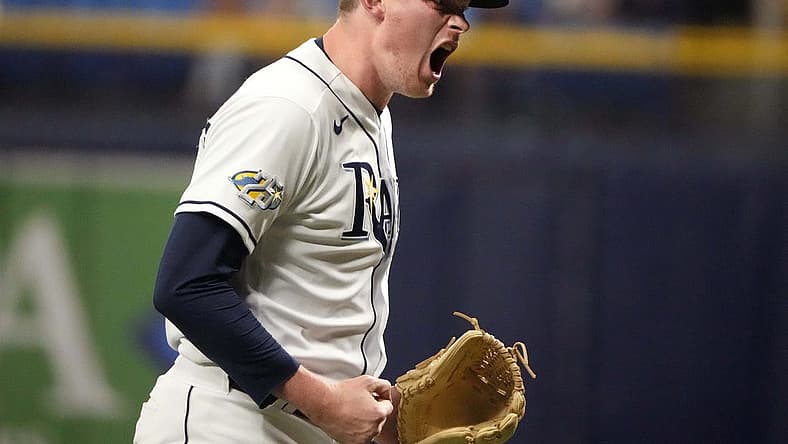 Aug 23, 2023; St. Petersburg, Florida, USA; Tampa Bay Rays relief pitcher Pete Fairbanks (29) celebrates after ending the tenth inning with a strikeout against the Colorado Rockies at Tropicana Field. Mandatory Credit: Dave Nelson-USA TODAY Sports
