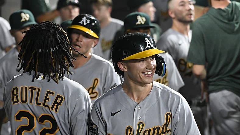 Aug 24, 2023; Chicago, Illinois, USA; Oakland Athletics second baseman Zack Gelof (20) celebrates in the dugout after he hits a two run home run against the Chicago White Sox during the seventh inning at Guaranteed Rate Field. Mandatory Credit: Matt Marton-USA TODAY Sports