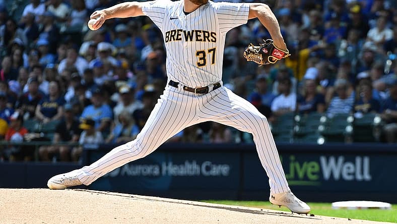 Aug 27, 2023; Milwaukee, Wisconsin, USA; Milwaukee Brewers starting pitcher Adrian Houser (37) delivers a pitch against the San Diego Padres in the first inning at American Family Field. Mandatory Credit: Michael McLoone-USA TODAY Sports