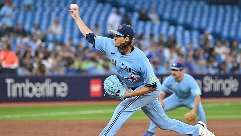 Aug 28, 2023; Toronto, Ontario, CAN; Toronto Blue Jays starting pitcher Kevin Gausman (34) delivers a pitch against the Washington National in the second inning at Rogers Centre. Mandatory Credit: Dan Hamilton-USA TODAY Sports