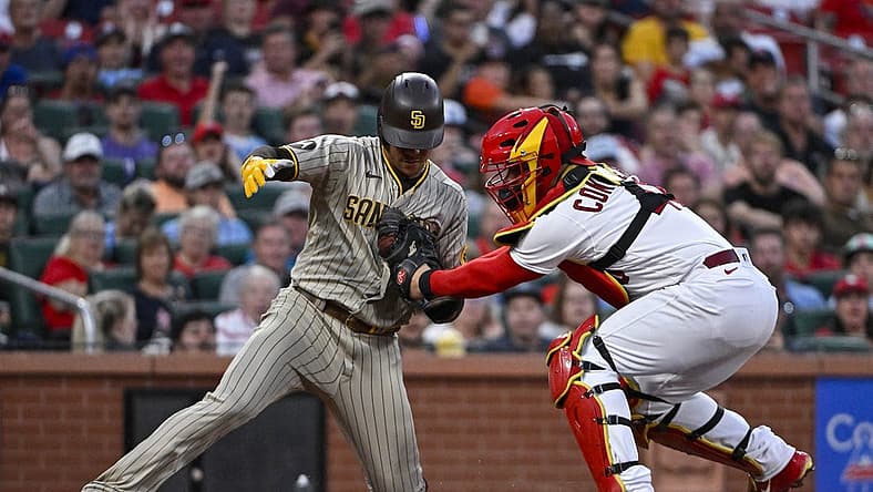 Aug 29, 2023; St. Louis, Missouri, USA; St. Louis Cardinals catcher Willson Contreras (40) tags out San Diego Padres left fielder Juan Soto (22) during the third inning at Busch Stadium. Mandatory Credit: Jeff Curry-USA TODAY Sports