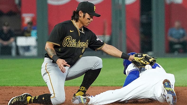 Aug 29, 2023; Kansas City, Missouri, USA; Kansas City Royals left fielder Dairon Blanco (44) steals second base as Pittsburgh Pirates second baseman Ji Hwan Bae (3) misses the tag in the third inning at Kauffman Stadium. Mandatory Credit: Denny Medley-USA TODAY Sports