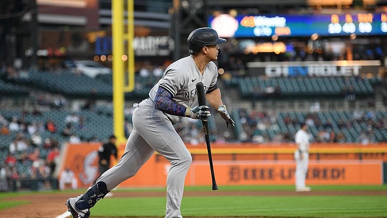 Aug 30, 2023; Detroit, Michigan, USA; New York Yankees designated hitter Giancarlo Stanton (27) watches his ball fly over the right center field wall for a home run against the Detroit Tigers in the fourth inning at Comerica Park. Mandatory Credit: Lon Horwedel-USA TODAY Sports