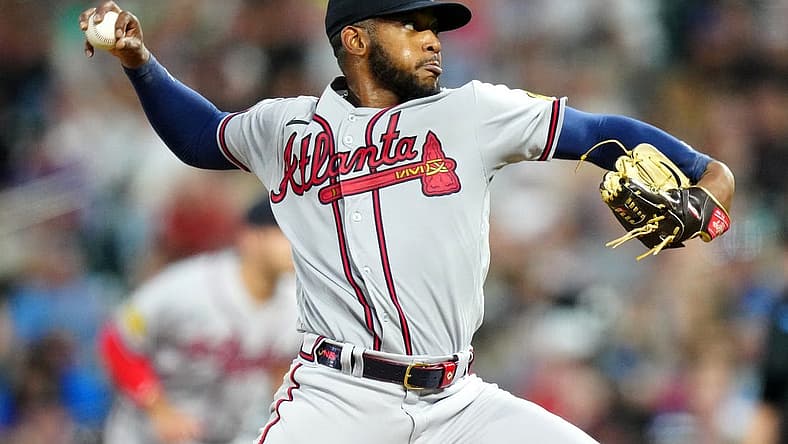 Aug 30, 2023; Denver, Colorado, USA; Atlanta Braves starting pitcher Darius Vines (64) delivers a pitch in the fourth inning against the Colorado Rockies at Coors Field. Mandatory Credit: Ron Chenoy-USA TODAY Sports