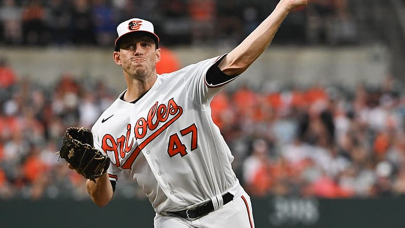 Apr 13, 2022; Baltimore, Maryland, USA;  Baltimore Orioles starting pitcher John Means (47) delivers a first inning pitch against the Milwaukee Brewers at Oriole Park at Camden Yards. Mandatory Credit: Tommy Gilligan-USA TODAY Sports