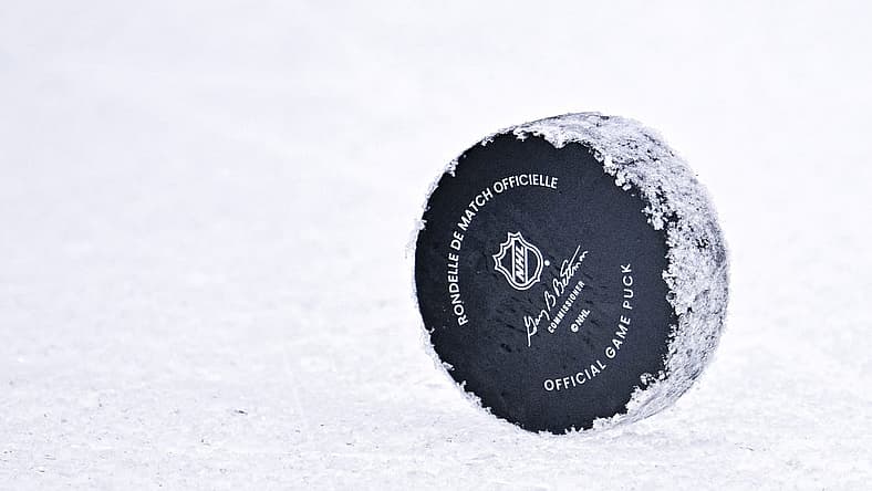 Oct 27, 2022; Dallas, Texas, USA; A general view of an NHL hockey puck during the game between the Dallas Stars and the Washington Capitals at the American Airlines Center. Mandatory Credit: Jerome Miron-USA TODAY Sports