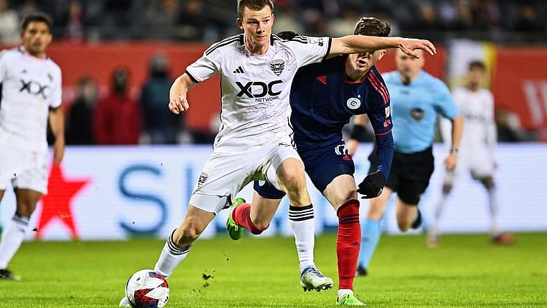 Apr 1, 2023; Chicago, Illinois, USA; DC United midfielder Chris Durkin (8) controls the ball against the Chicago Fire FC at Soldier Field. Mandatory Credit: Jamie Sabau-USA TODAY Sports