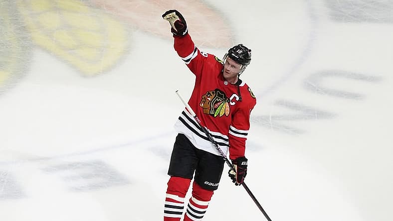 Apr 13, 2023; Chicago, Illinois, USA; Chicago Blackhawks center Jonathan Toews (19) is honored after the game against the Philadelphia Flyers. He played his last game as a Blackhawk, at United Center. Mandatory Credit: David Banks-USA TODAY Sports