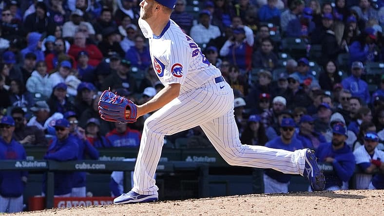 Apr 27, 2023; Chicago, Illinois, USA; Chicago Cubs relief pitcher Brad Boxberger (25) throws against the San Diego Padres during the ninth inning at Wrigley Field. Mandatory Credit: David Banks-USA TODAY Sports